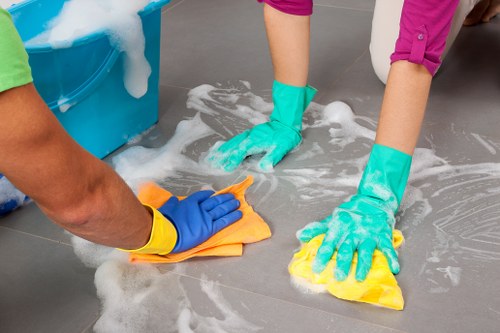 Carpet cleaning technician preparing equipment before a service appointment